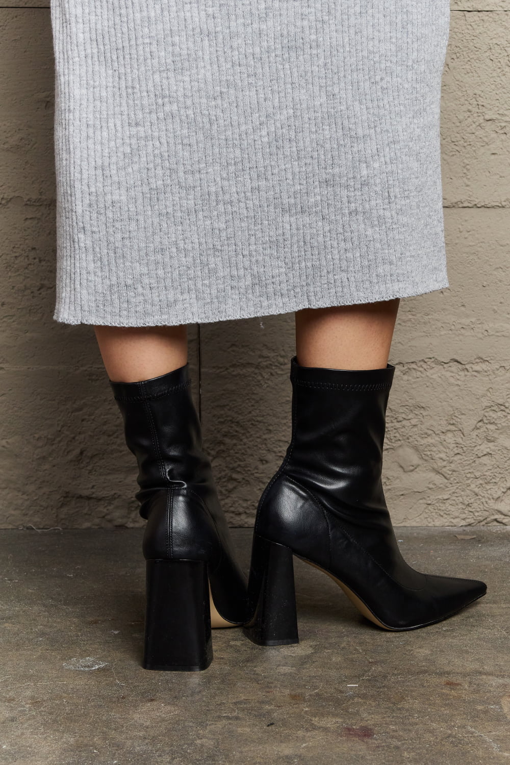 Get trendy with Weeboo Stacy Block Heel Sock Boots - Shoes available at Styles Code. Grab yours today!