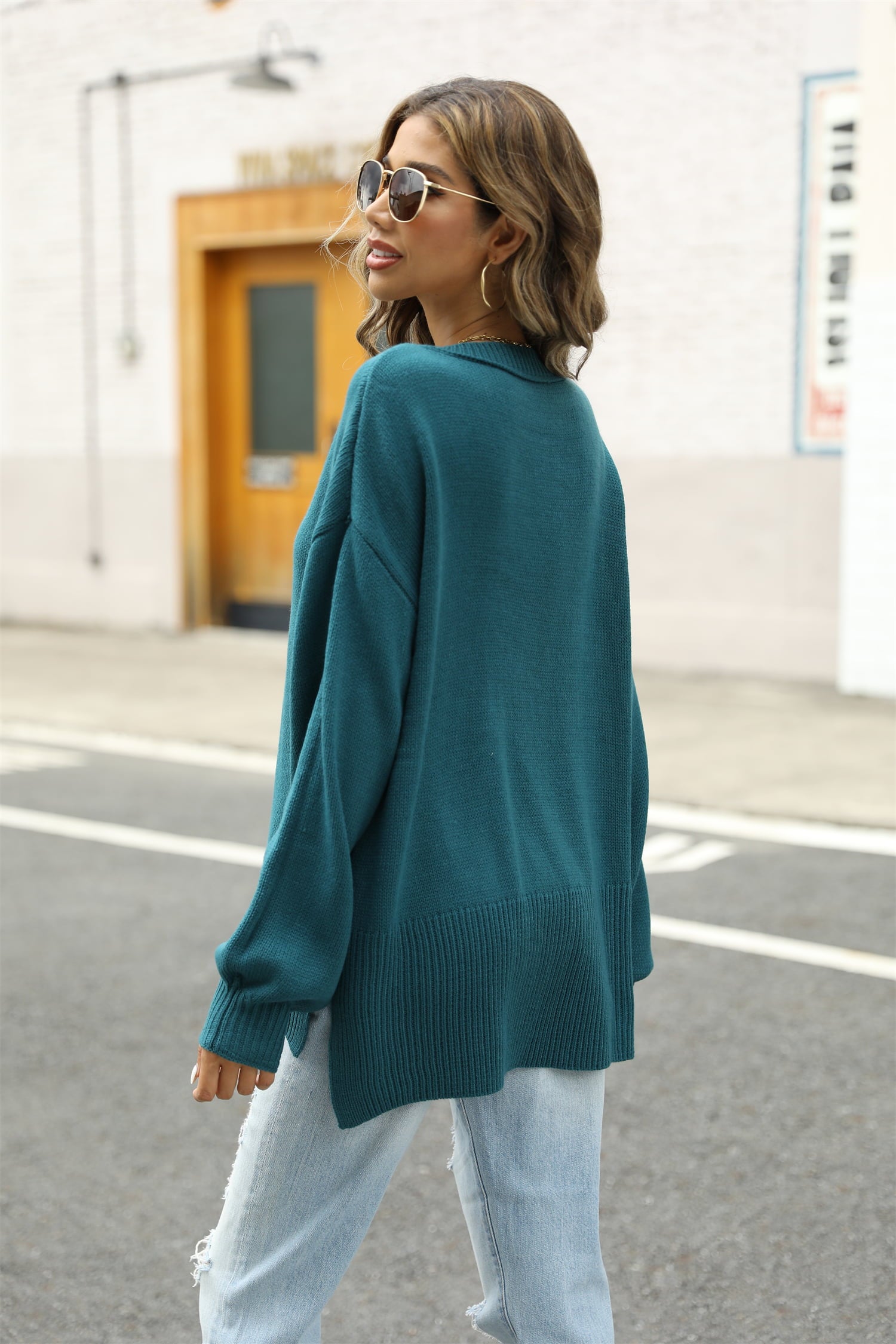 Get trendy with Round Neck Dropped Shoulder Slit Sweater - Sweater available at Styles Code. Grab yours today!