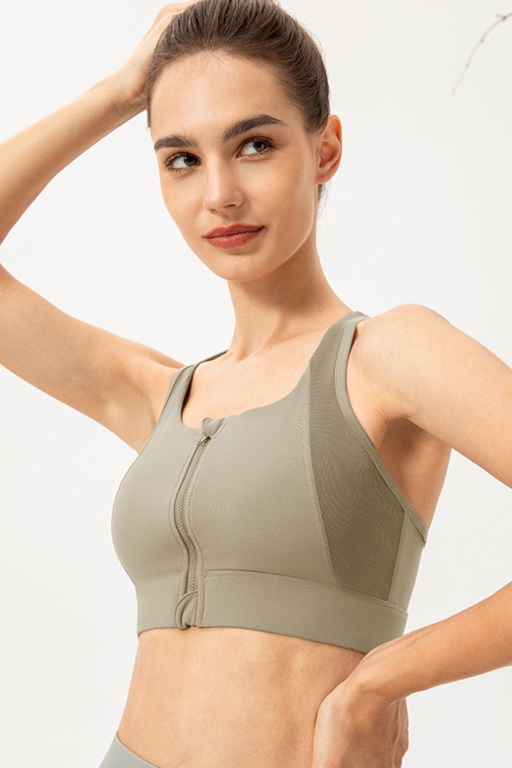 Get trendy with Zip-Up Round Neck Sports Bra - Activewear available at Styles Code. Grab yours today!