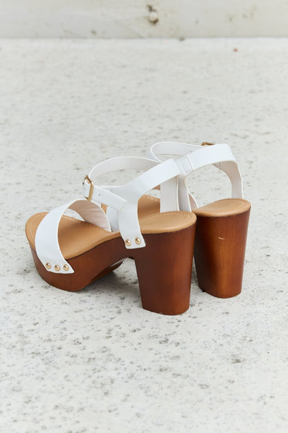 Get trendy with DDK Time After Time Wooden Platform Strap Heels - Shoes available at Styles Code. Grab yours today!