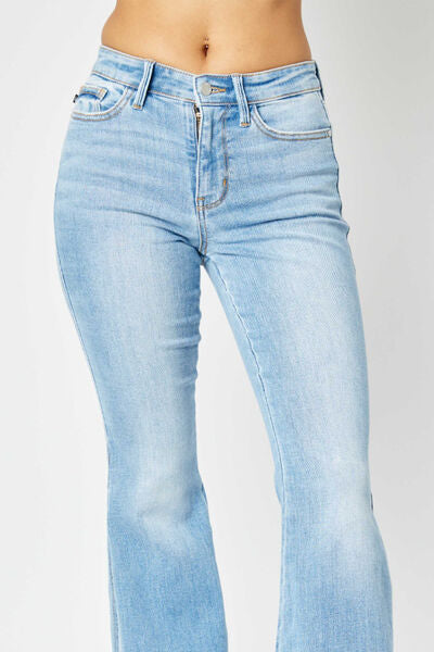 Get trendy with Judy Blue Full Size Mid Rise Raw Hem Slit Flare Jeans - Jeans available at Styles Code. Grab yours today!