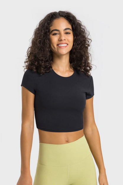 Get trendy with Round Neck Short Sleeve Cropped Sports T-Shirt - Activewear available at Styles Code. Grab yours today!