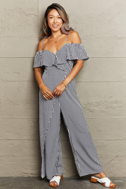 Get trendy with Striped Spaghetti Strap Cold-Shoulder Jumpsuit - Jumpsuits available at Styles Code. Grab yours today!